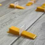 b78a0911b4b07d0d7798a0a604a3fed2.jpg_720x720q80.jpg_.Product details of Tile Leveling Spacers Tile Leveling System ( 100pcs WEDGES REUSEABLE ) (PACKAGE INCLUDE ONLY RED WEDGES 100PCS)
